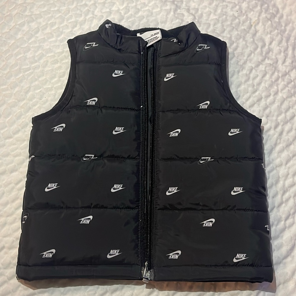 Black Nike vest puffer, size 12m , boys